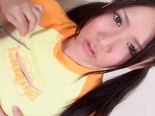 Get a load of this! Super sexy Nippon teen with high heels chomping down on a XXX ice-cream cone in Tokyo!