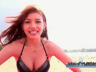 Japanese babe teasing her tight nipples at Tokyo cityscape