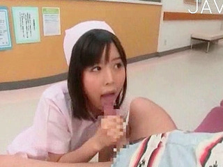 Sucking cock under the Tokyo skyline with a lustful nurse from Nippon